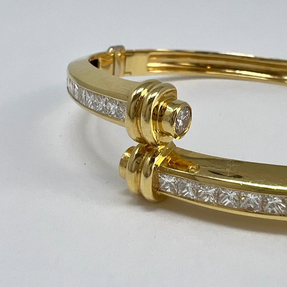 18K Gold Hinged Bracelet with 22 Princess Cut Diamonds