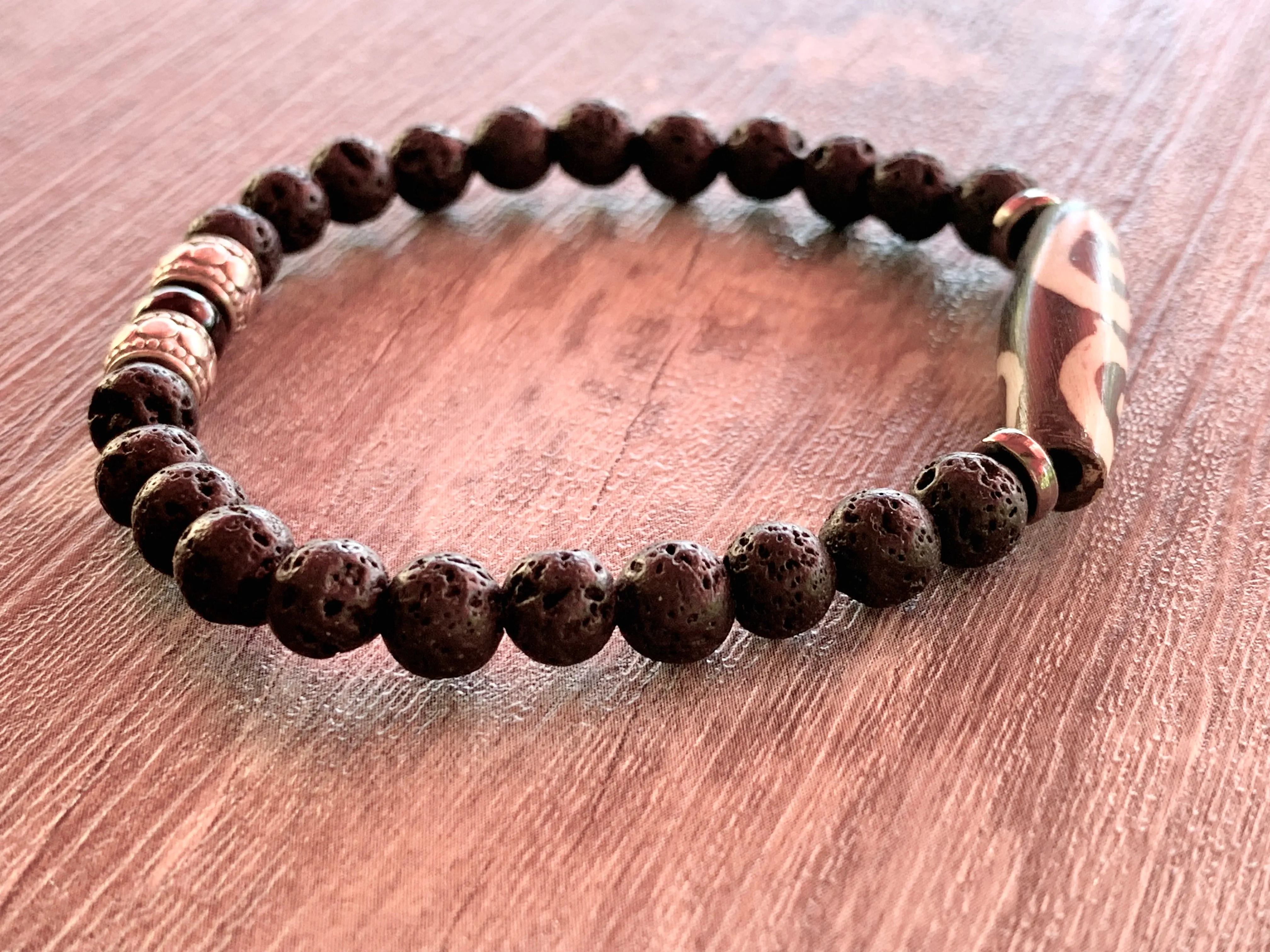 Omari Handmade Tribal Carved Bone, Black Lava Stone, and Black Tourmaline Expandable Bracelet