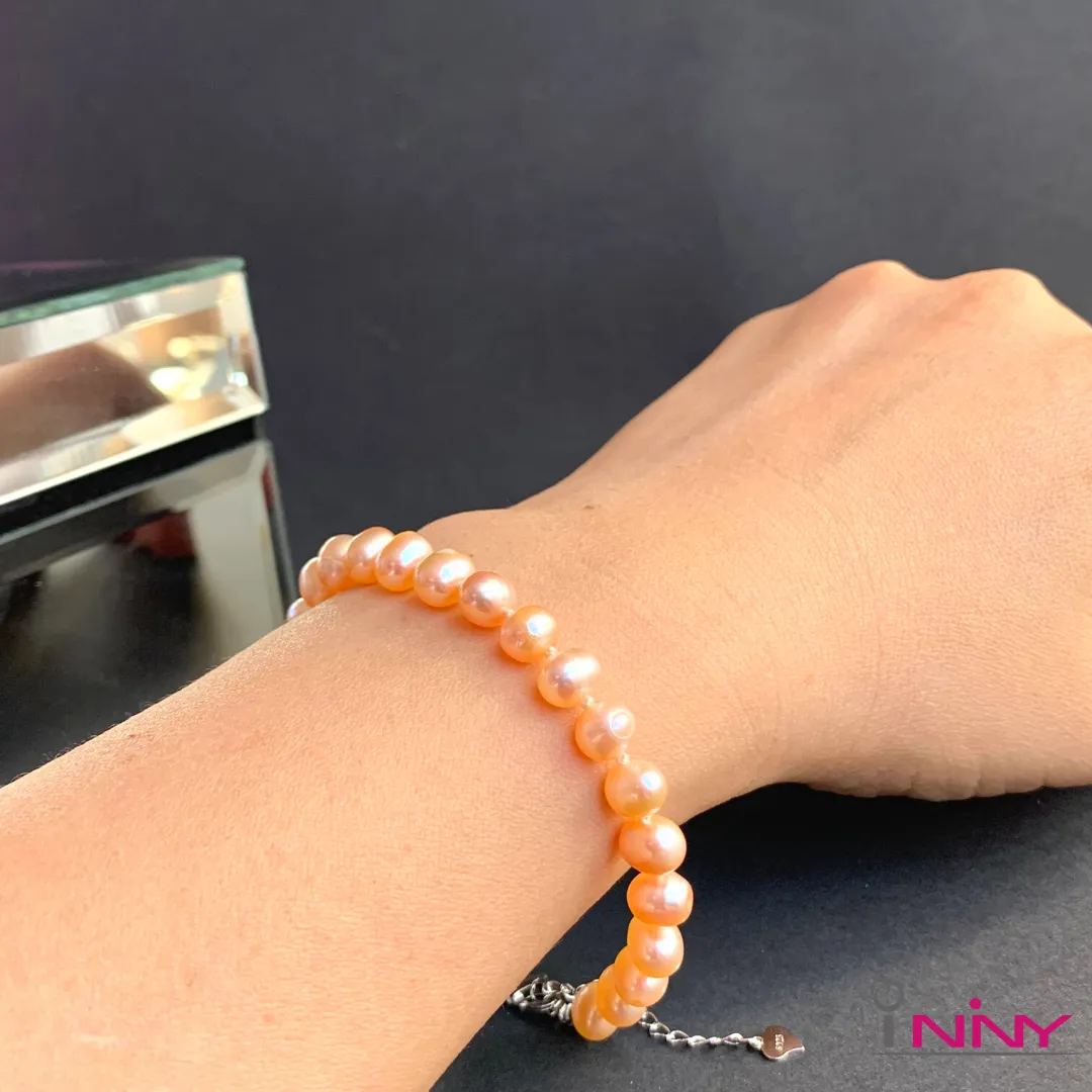Peach Pearl Knotted Bracelet